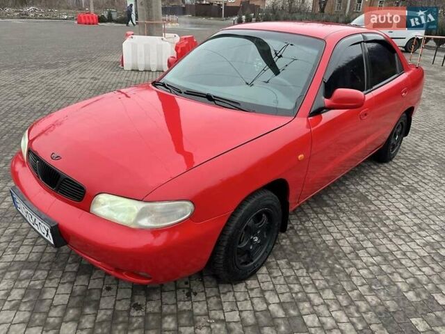 Червоний Деу Нубіра, об'ємом двигуна 1.6 л та пробігом 331 тис. км за 2350 $, фото 1 на Automoto.ua