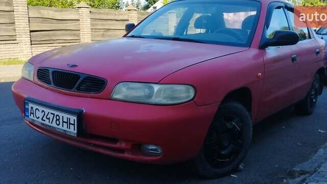 Красный Дэу Нубира, объемом двигателя 1.6 л и пробегом 346 тыс. км за 1500 $, фото 1 на Automoto.ua