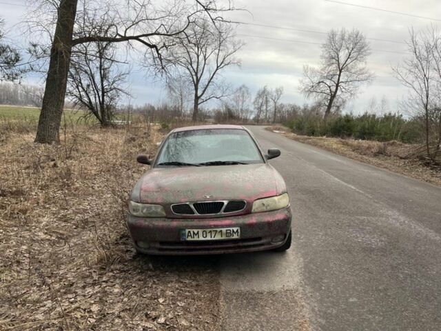 Красный Дэу Нубира, объемом двигателя 1.6 л и пробегом 347 тыс. км за 339 $, фото 1 на Automoto.ua