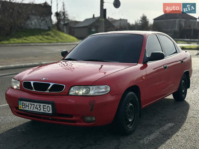 Червоний Деу Нубіра, об'ємом двигуна 1.6 л та пробігом 180 тис. км за 1750 $, фото 1 на Automoto.ua