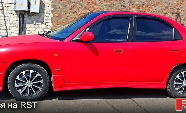 Красный Дэу Нубира, объемом двигателя 1.6 л и пробегом 195 тыс. км за 3500 $, фото 1 на Automoto.ua