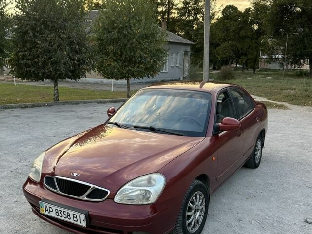 Красный Дэу Нубира, объемом двигателя 2 л и пробегом 302 тыс. км за 2050 $, фото 1 на Automoto.ua