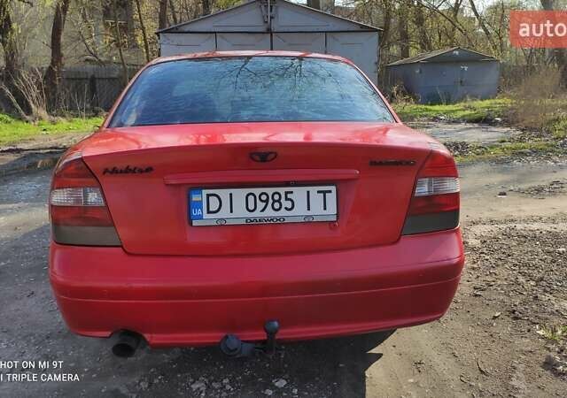 Красный Дэу Нубира, объемом двигателя 2 л и пробегом 300 тыс. км за 1750 $, фото 1 на Automoto.ua