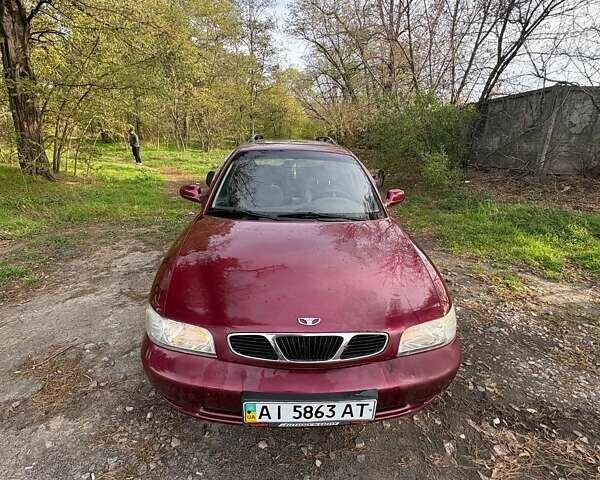 Красный Дэу Нубира, объемом двигателя 1.6 л и пробегом 190 тыс. км за 2350 $, фото 1 на Automoto.ua