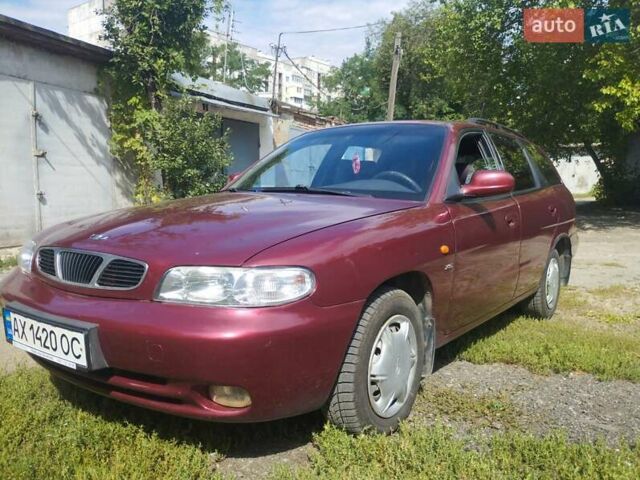 Красный Дэу Нубира, объемом двигателя 1.6 л и пробегом 226 тыс. км за 2600 $, фото 1 на Automoto.ua