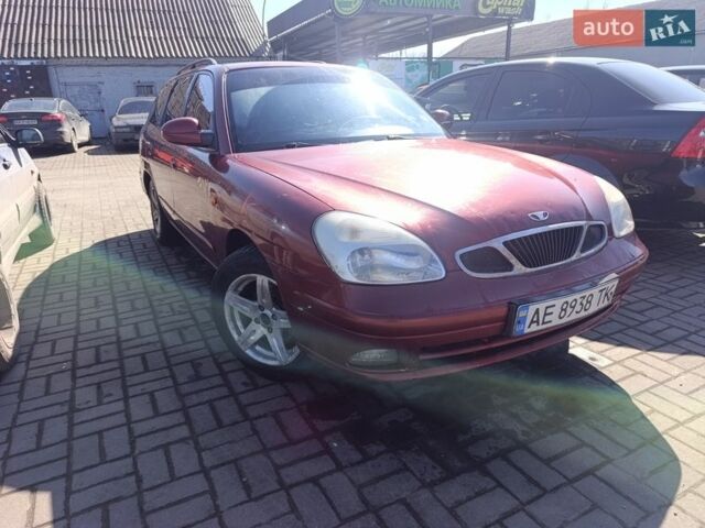 Красный Дэу Нубира, объемом двигателя 1.6 л и пробегом 230 тыс. км за 1700 $, фото 1 на Automoto.ua