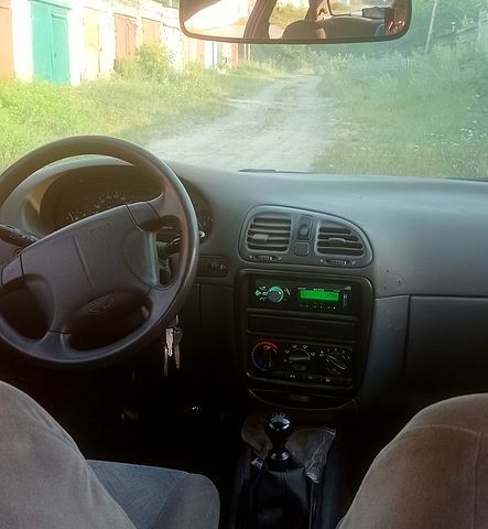 Серый Дэу Нубира, объемом двигателя 1.6 л и пробегом 303 тыс. км за 3500 $, фото 1 на Automoto.ua