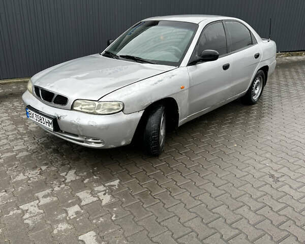 Серый Дэу Нубира, объемом двигателя 1.6 л и пробегом 255 тыс. км за 713 $, фото 1 на Automoto.ua