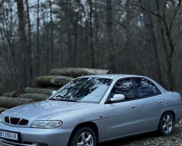 Серый Дэу Нубира, объемом двигателя 1.6 л и пробегом 235 тыс. км за 1900 $, фото 1 на Automoto.ua