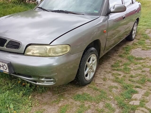 Серый Дэу Нубира, объемом двигателя 1.6 л и пробегом 300 тыс. км за 1350 $, фото 1 на Automoto.ua