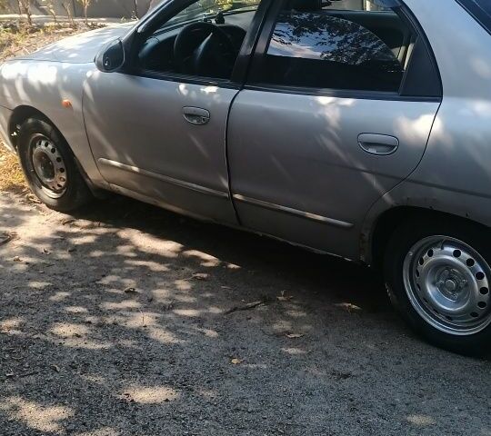 Сірий Деу Нубіра, об'ємом двигуна 2 л та пробігом 290 тис. км за 900 $, фото 1 на Automoto.ua