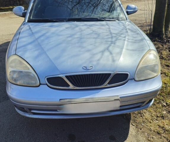 Серый Дэу Нубира, объемом двигателя 1.6 л и пробегом 400 тыс. км за 1580 $, фото 1 на Automoto.ua