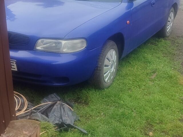 Синій Деу Нубіра, об'ємом двигуна 1.6 л та пробігом 203 тис. км за 950 $, фото 1 на Automoto.ua