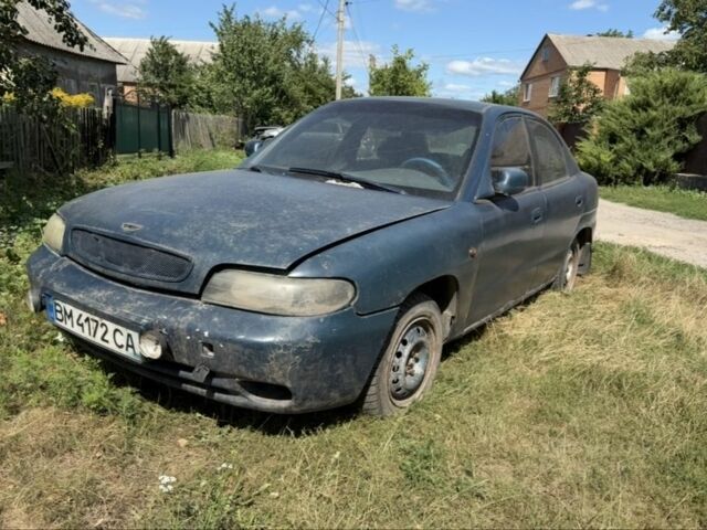 Синий Дэу Нубира, объемом двигателя 1.6 л и пробегом 311 тыс. км за 501 $, фото 1 на Automoto.ua