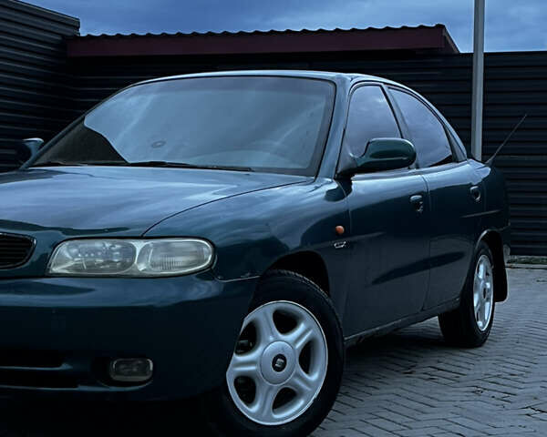 Зеленый Дэу Нубира, объемом двигателя 1.6 л и пробегом 250 тыс. км за 1200 $, фото 1 на Automoto.ua