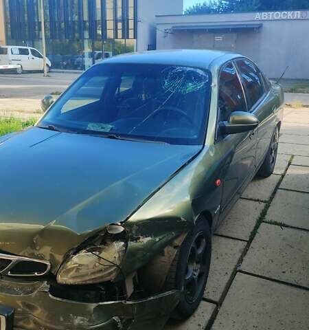 Зеленый Дэу Нубира, объемом двигателя 2 л и пробегом 330 тыс. км за 600 $, фото 1 на Automoto.ua