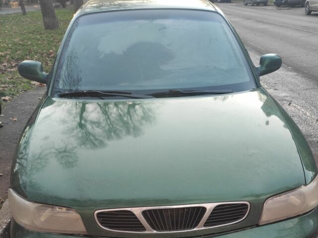 Зеленый Дэу Нубира, объемом двигателя 1.6 л и пробегом 420 тыс. км за 1200 $, фото 1 на Automoto.ua