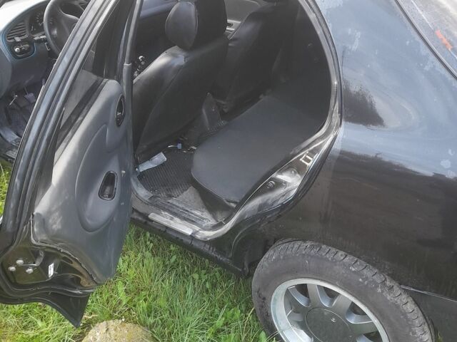 Черный Дэу Сенс, объемом двигателя 1.5 л и пробегом 205 тыс. км за 1200 $, фото 1 на Automoto.ua