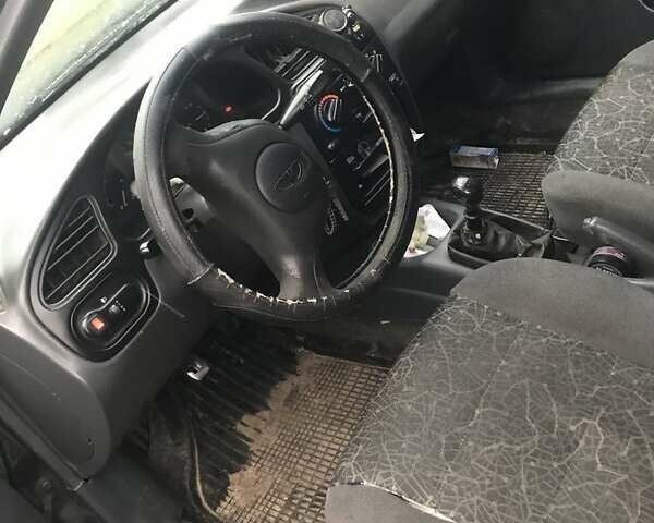 Чорний Деу Сенс, об'ємом двигуна 1.3 л та пробігом 200 тис. км за 2050 $, фото 1 на Automoto.ua