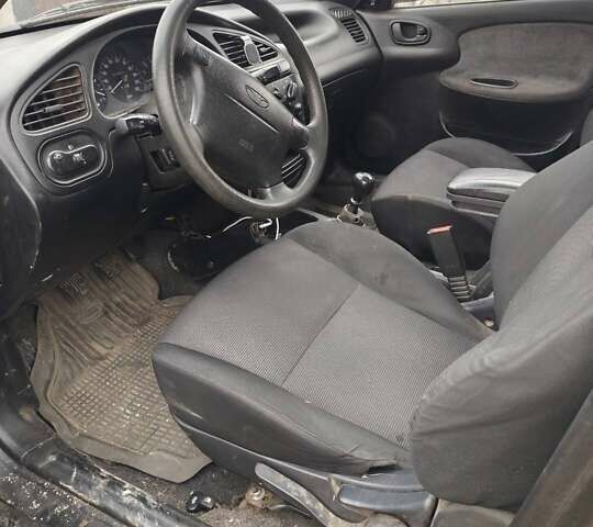 Черный Дэу Сенс, объемом двигателя 1.6 л и пробегом 230 тыс. км за 2000 $, фото 1 на Automoto.ua