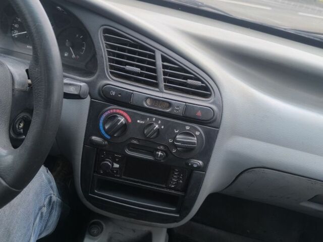 Черный Дэу Сенс, объемом двигателя 1.5 л и пробегом 204 тыс. км за 1000 $, фото 1 на Automoto.ua