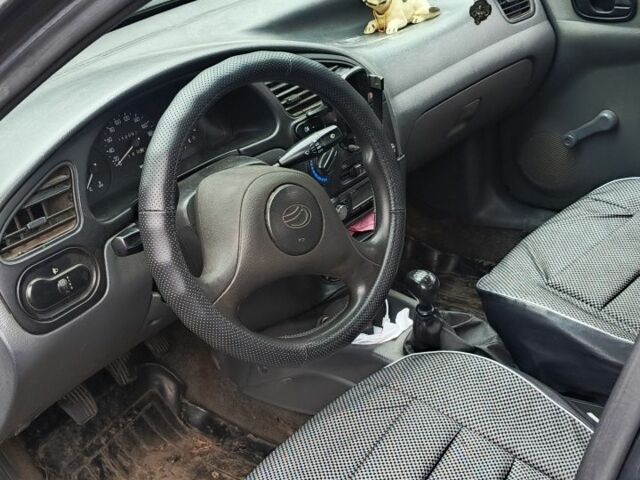 Черный Дэу Сенс, объемом двигателя 1.3 л и пробегом 112 тыс. км за 2400 $, фото 1 на Automoto.ua