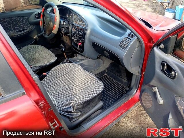 Червоний Деу Сенс, об'ємом двигуна 1.3 л та пробігом 100 тис. км за 1200 $, фото 1 на Automoto.ua