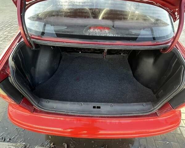 Червоний Деу Сенс, об'ємом двигуна 1.3 л та пробігом 258 тис. км за 1450 $, фото 1 на Automoto.ua