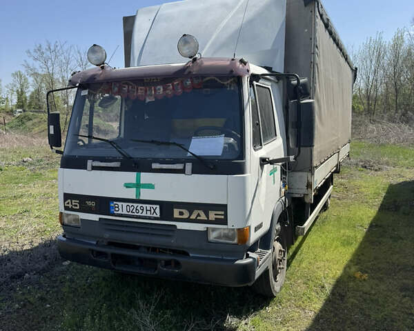 Білий Даф 45, об'ємом двигуна 5.9 л та пробігом 404 тис. км за 5100 $, фото 1 на Automoto.ua