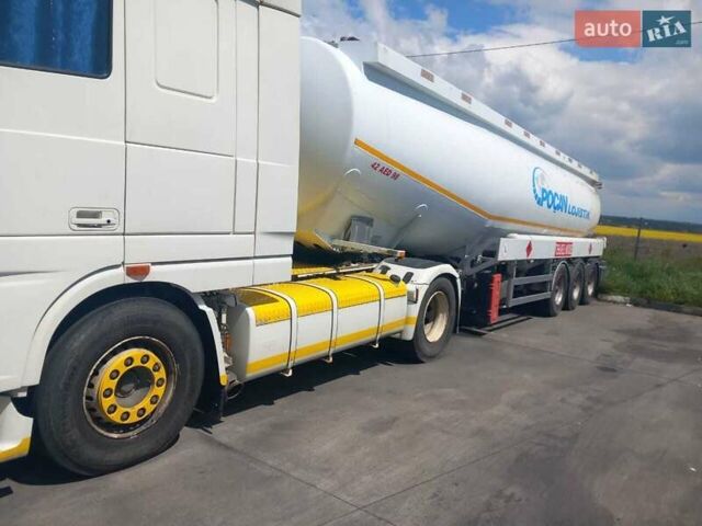 Белый Даф XF 105, объемом двигателя 12.9 л и пробегом 780 тыс. км за 7000 $, фото 1 на Automoto.ua