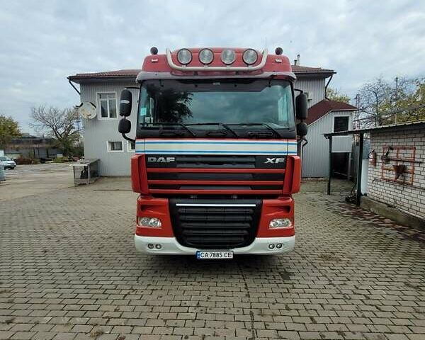 Красный Даф XF 105, объемом двигателя 12.9 л и пробегом 929 тыс. км за 12000 $, фото 1 на Automoto.ua