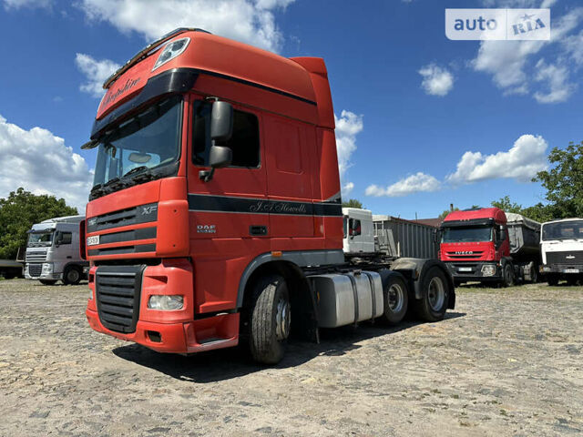 Красный Даф XF 105, объемом двигателя 12.9 л и пробегом 942 тыс. км за 15000 $, фото 1 на Automoto.ua