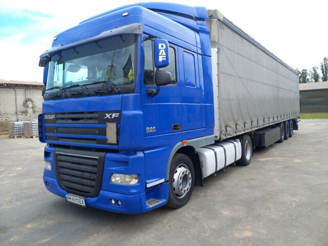 Синий Даф XF 105, объемом двигателя 12.9 л и пробегом 960 тыс. км за 18000 $, фото 1 на Automoto.ua