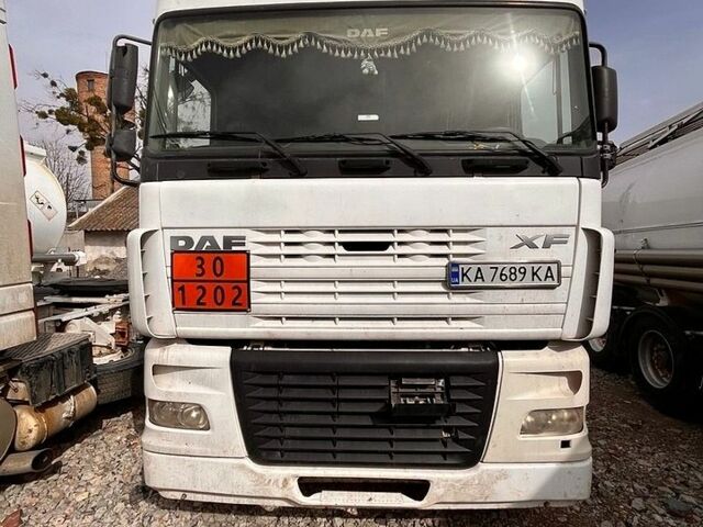 Белый Даф XF 95, объемом двигателя 12.58 л и пробегом 900 тыс. км за 6400 $, фото 1 на Automoto.ua