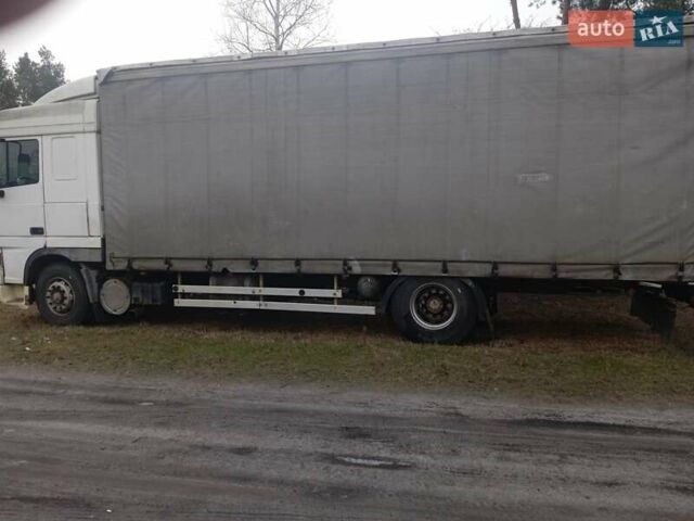 Белый Даф XF 95, объемом двигателя 12.6 л и пробегом 700 тыс. км за 8300 $, фото 1 на Automoto.ua