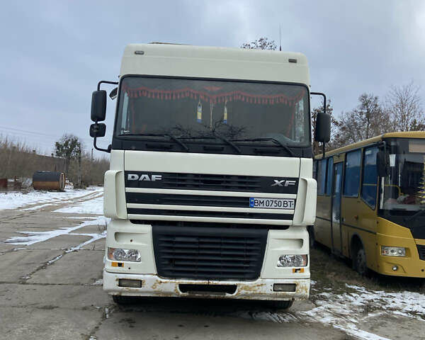 Белый Даф XF 95, объемом двигателя 12.58 л и пробегом 100 тыс. км за 11000 $, фото 1 на Automoto.ua