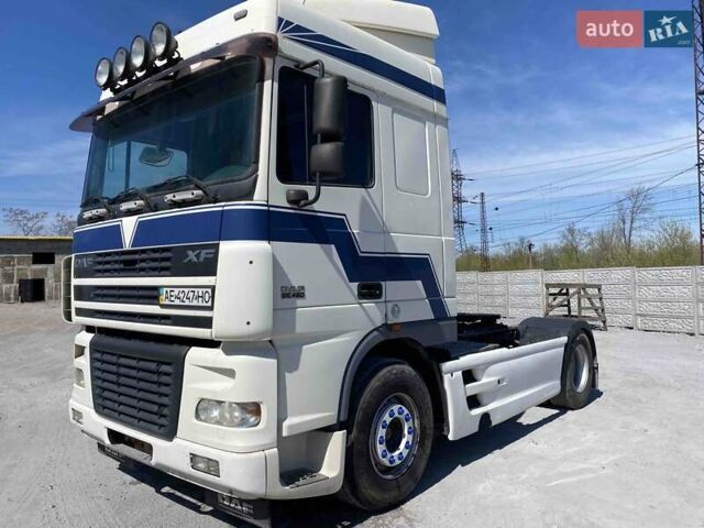 Белый Даф XF 95, объемом двигателя 12.58 л и пробегом 990 тыс. км за 10000 $, фото 1 на Automoto.ua