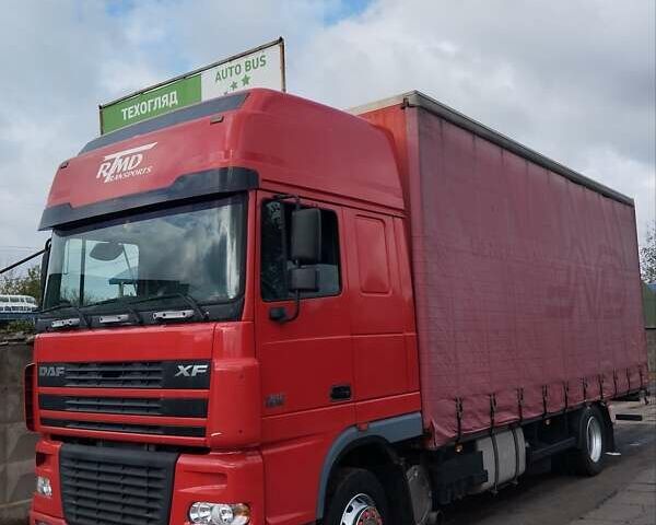 Красный Даф XF 95, объемом двигателя 12.58 л и пробегом 789 тыс. км за 18000 $, фото 1 на Automoto.ua