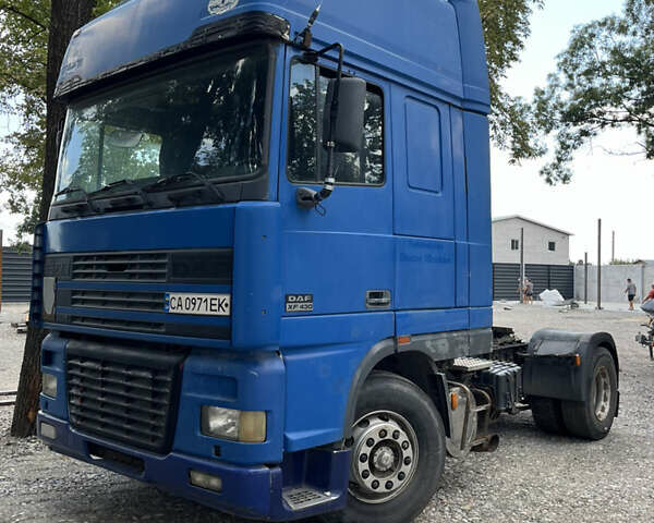 Синий Даф XF 95, объемом двигателя 12.58 л и пробегом 400 тыс. км за 5350 $, фото 1 на Automoto.ua