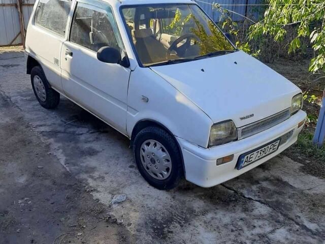 Белый Дайхатсу Куоре, объемом двигателя 0.8 л и пробегом 200 тыс. км за 725 $, фото 1 на Automoto.ua