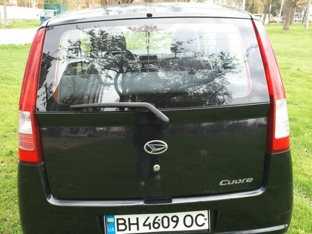 Черный Дайхатсу Куоре, объемом двигателя 1 л и пробегом 122 тыс. км за 3500 $, фото 1 на Automoto.ua