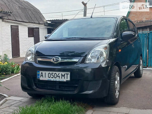 Черный Дайхатсу Куоре, объемом двигателя 1 л и пробегом 149 тыс. км за 3850 $, фото 1 на Automoto.ua