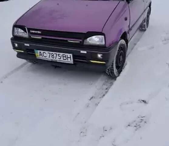 Фиолетовый Дайхатсу Куоре, объемом двигателя 0.85 л и пробегом 100 тыс. км за 581 $, фото 1 на Automoto.ua