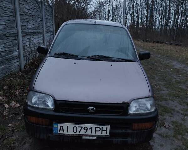 Фиолетовый Дайхатсу Куоре, объемом двигателя 0.85 л и пробегом 155 тыс. км за 2000 $, фото 1 на Automoto.ua