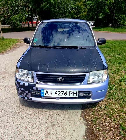 Синий Дайхатсу Куоре, объемом двигателя 1 л и пробегом 166 тыс. км за 2550 $, фото 1 на Automoto.ua
