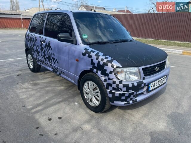 Синий Дайхатсу Куоре, объемом двигателя 0.9 л и пробегом 160 тыс. км за 3500 $, фото 1 на Automoto.ua