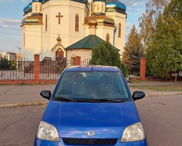 Синий Дайхатсу Куоре, объемом двигателя 0.99 л и пробегом 127 тыс. км за 3950 $, фото 1 на Automoto.ua