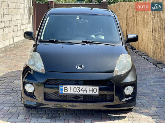 Чорний Дайхатсу Sirion, об'ємом двигуна 1.3 л та пробігом 159 тис. км за 5900 $, фото 1 на Automoto.ua