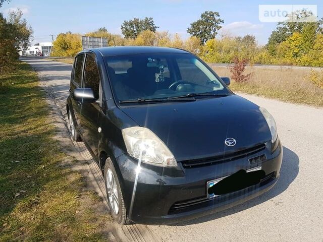 Чорний Дайхатсу Sirion, об'ємом двигуна 1.3 л та пробігом 110 тис. км за 6100 $, фото 1 на Automoto.ua