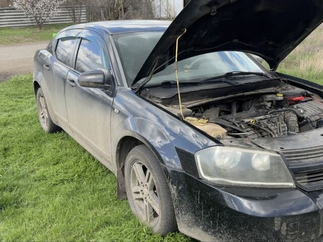 Черный Додж Авенджер, объемом двигателя 2 л и пробегом 170 тыс. км за 3452 $, фото 1 на Automoto.ua